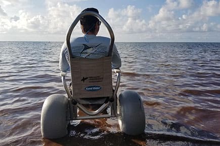 sand rider beach wheelchair donated by Surfing's Evolution & Preservation Foundation