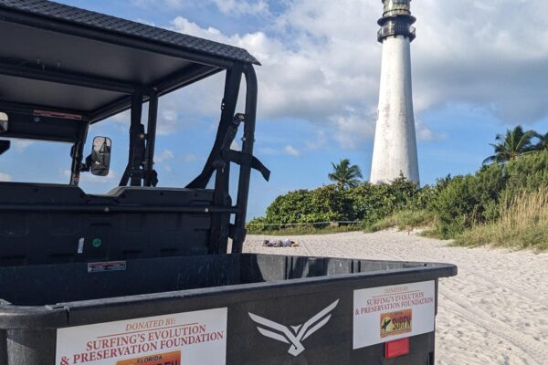 donated UTV at Bill Baggs on the beach with a lighthouse in the background