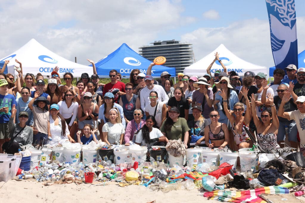 Group shot of attendees on beach at World Ocean Celebration 26-026